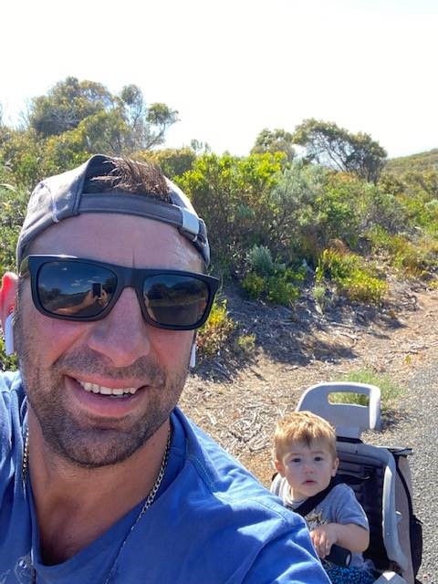 Daniel and son going for a bike ride