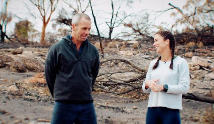 Two adults having a chat in the wild